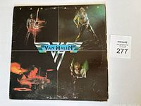 Front cover of Van Halen 1978 vinyl album showing band members and logo.