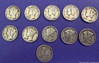 All 11 1945 Mercury dimes arranged on blue background