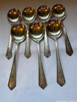 Seven sterling soup spoons overview