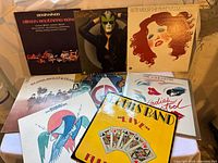 Group shot showing all eight LP jackets