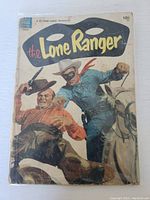 Front cover photo of The Lone Ranger #69 comic book by Dell Comics, 1954, showing main characters and signs of wear and age.