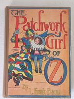 Front cover of The Patchwork Girl of Oz showing colorful illustration with title and author.