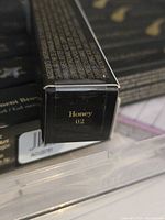 Box showing shade name Honey 02