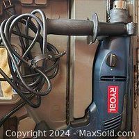 Ryobi 1/2 inch hammer drill showing body, cord, and side handle clearly, indicating physical condition and features.