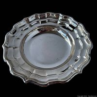 Top view of the round Birks sterling silver dish showing the scalloped edge and polished finish.