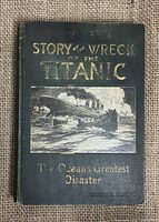 Front cover of the book showing title and sinking Titanic illustration with gold embossed text.