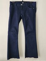 Front view of dark navy Seductions stretch denim jeans with five pockets and button closure, showing full length and style.