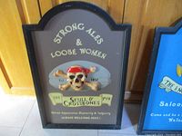 Front view of embossed bar sign showing the main artwork and text