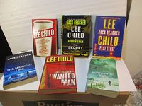 All seven Jack Reacher books arranged together for overview.
