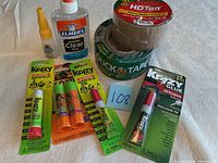 Photo showing the full lot on white cloth background with all items visible