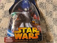 Star Wars Revenge of the Sith General Grievous figurine with packaging showing full figure and branding