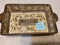 Top-down view of Temptations ceramic casserole dish showing inside pattern and shape