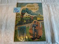 Front cover photo showing comic book title and illustration of steam locomotive and Abraham Lincoln.