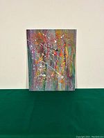 Full view of the colorful abstract oil painting on board, showing overall composition and colors.