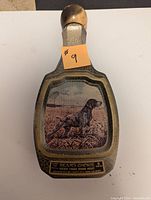 Front view of the Jim Beam's Choice whiskey bottle featuring a German Shorthaired Pointer image and label.