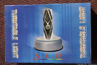 Box showing product name 'Turntable Light' and brand 'S.L.H' with an image of the turntable light display stand.