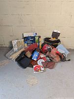 Full lot including King Canada 3x21 belt sander, multiple sanding belts, discs, sheets, and storage bag.