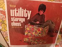 Vintage packaging image showing a woman using the floral utility storage chest with size shown as 25 x 13 x 10.5 inches