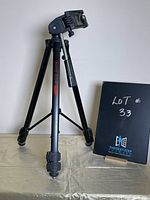 Black Blacks BX45 adjustable tripod standing fully extended with pan-and-tilt head and quick release mounting plate.