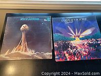 Front covers of two vinyl LP records: Best of Lighthouse and Supertramp in Paris