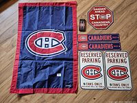 All items shown together including flag, signs, iPhone case