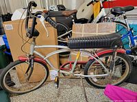 Full left-side view of the bicycle showing frame, handlebar, seat, and tires