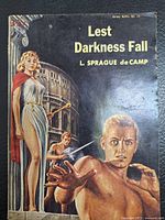 Front cover of the 1949 pulp science fiction paperback 'Lest Darkness Fall' depicting characters and title