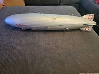 Side view of the large Hindenburg Zeppelin model showing full length, detail lettering, and tail fins with insignia.