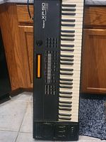 Full view of Roland XP-50 keyboard showing keys, control panel, and part of the built-in speaker.