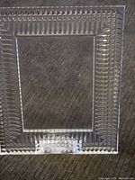 Front view of clear Waterford crystal picture frame showing the detailed cut pattern and beveled edges.