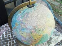 Photo showing a view of the globe displaying Europe, Asia, and surrounding regions with country borders and names visible.