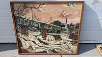 Full front view of painting showing rapids scene and wooden frame