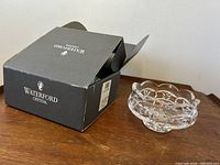 Waterford Crystal Mourne Pattern footed bowl displayed next to its original black box with logo.