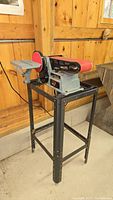 Front view of Delta belt/disc sander on stand