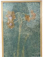 Close-up photo of the floral print artwork with textured teal-green background and orange flowers.