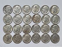 All 24 silver U.S. Roosevelt dimes laid out in 4 rows of 6 coins each, showing the obverse profile of Franklin D. Roosevelt.