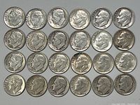 Top view of 24 silver Roosevelt dimes arranged in rows, showing the obverse (front) side with President Franklin D. Roosevelt's profile, dates ranging from 1946 to 1964.