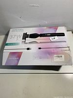 Box of the WDZSGJ rechargeable electric spin scrubber showing model and power specifications (37W).