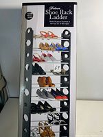 Front view of the box showing image of deluxe shoe rack holding various shoes, labeled as holding 30 pairs across 5 shelves.