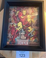 Front view of framed 3D Iron Man picture showing detailed comic art and black frame.