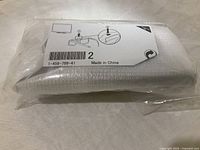 Unopened Sony 3D glasses in protective packaging showing item label