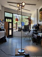 Full view of 72-inch chrome floor lamp in room