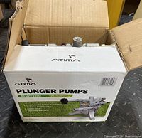 Box labeled 'Atima Plunger Pumps AT-VPP3200' showing the packaging of the pump.