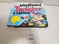 Game box showing Blindfolded Twister branding and colorful player illustrations