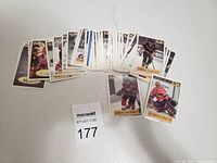 Fanned-out assortment of vintage hockey stickers from 1996, showing individual player images and names.