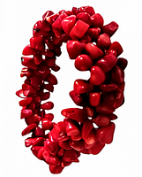 Photo showing the bracelet with its chunky coral pieces and vibrant red color giving a dense, natural look.