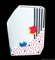 Front and side views of mid century modern styled porcelain vase with geometric multicolor pattern and black stripes.