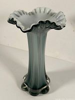 Full view of the Italian glass vase showcasing the smoky green to white gradient with a ruffled top and ribbed vertical texture.