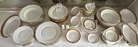 Overview of lot: dinner plates, salad plates, bowls, cups, saucers, serving pieces