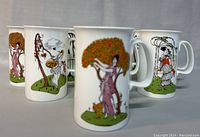 Front view of several fine china mugs with different oriental ladies designs